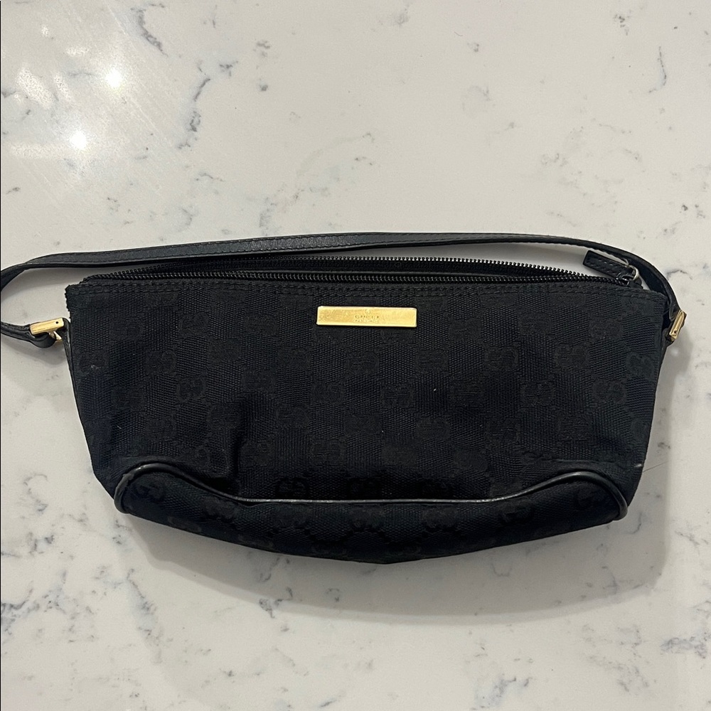 Gucci Authentic Black Hand Bag with Gold Accents